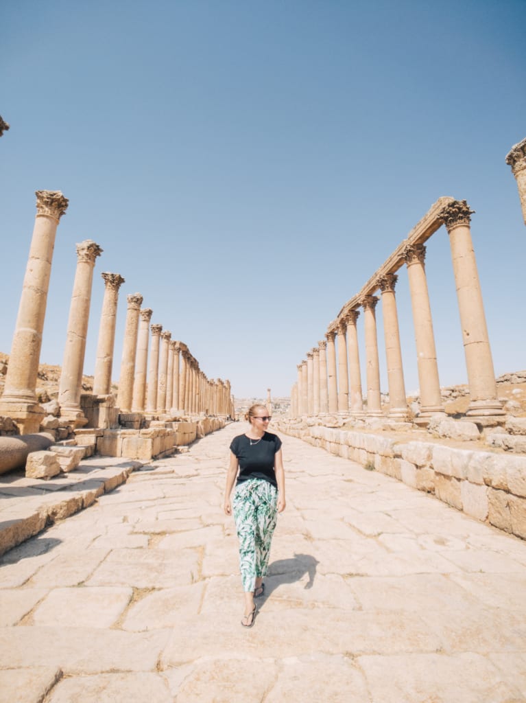 Alexandra Hayward (@findingalexx) walking through the ancient town of Jerash in Jordan