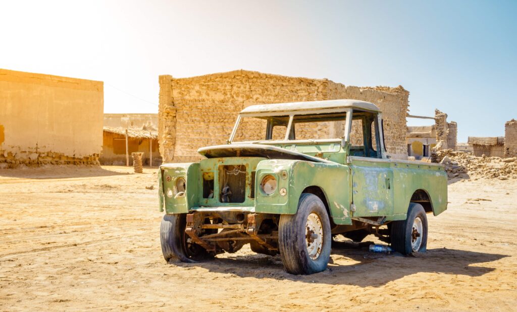 Picture of Jazirat al hamra with old car